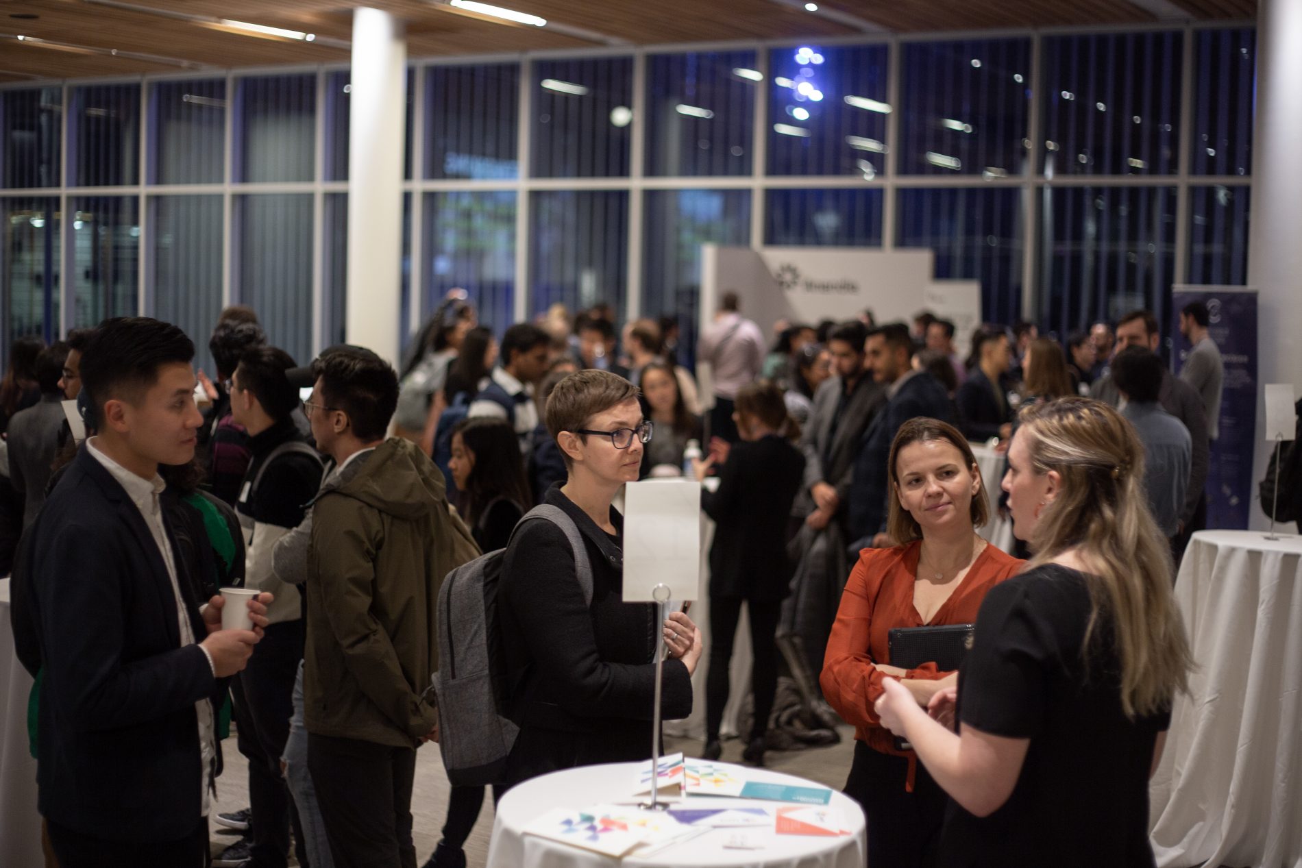 Keen students meet with industry professionals at a networking event (Industry Nights) in the UBC Alumni Centre.